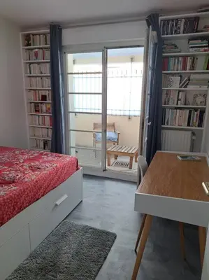 Un ou plusieurs lits dans un hébergement de l'établissement Appartement cosy avec jardin et parking