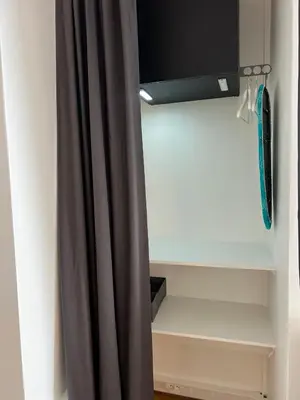 Télévision ou salle de divertissement dans l'établissement Le refuge du 15