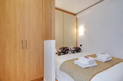 Un ou plusieurs lits dans un hébergement de l'établissement Dream Home near Sacre Coeur