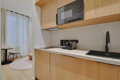 Cuisine ou kitchenette dans l'établissement Modern studio - 2P - Montmartre - Sacre Coeur