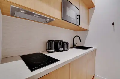 Cuisine ou kitchenette dans l'établissement Modern studio - 2P - Montmartre - Sacre Coeur