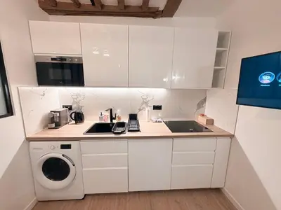 Cuisine ou kitchenette dans l'établissement Cosy Montorgueil Paris 2