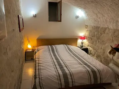 Un ou plusieurs lits dans un hébergement de l'établissement ChezAdrienParis - Appartement de 90m2 en souplex