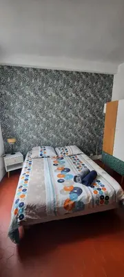 Un ou plusieurs lits dans un hébergement de l'établissement Studio Rue st Martin