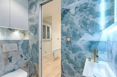 Salle de bains dans l'établissement Coeur du Marais Arts&Metiers Magnifique Appartement