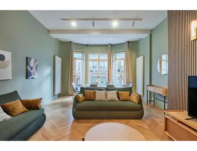 Télévision ou salle de divertissement dans l'établissement Residence Trocadero by Studio prestige
