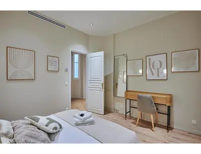 Un ou plusieurs lits dans un hébergement de l'établissement Residence Trocadero by Studio prestige