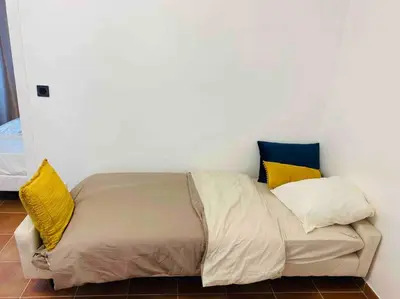 Un ou plusieurs lits dans un hébergement de l'établissement Appartement Quartier Latin Paris 5 ème