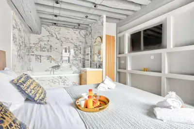 Un ou plusieurs lits dans un hébergement de l'établissement 335 Suite ME3D - Superb apartment in Paris