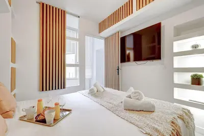 Un ou plusieurs lits dans un hébergement de l'établissement 335 Suite ME3D - Superb apartment in Paris