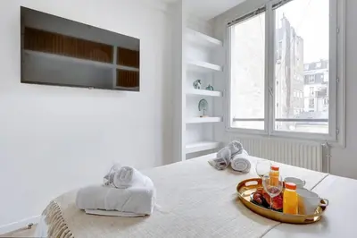 Un ou plusieurs lits dans un hébergement de l'établissement 335 Suite ME3D - Superb apartment in Paris