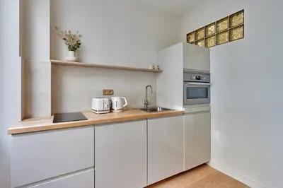 Cuisine ou kitchenette dans l'établissement Sublime studio Beaubourg by Studio prestige