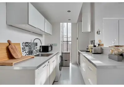 Cuisine ou kitchenette dans l'établissement Duplex Center of Paris by Studio prestige