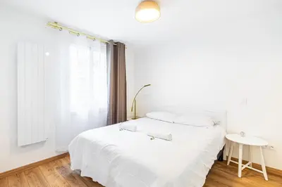 Un ou plusieurs lits dans un hébergement de l'établissement Paris cœur Quartier de Latin Superbe appartement de 40 m2