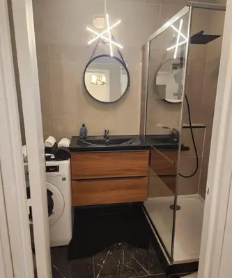 Salle de bains dans l'établissement Appartement La Défense