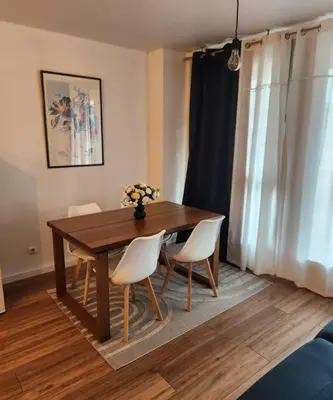 Coin salon dans l'établissement Appartement La Défense