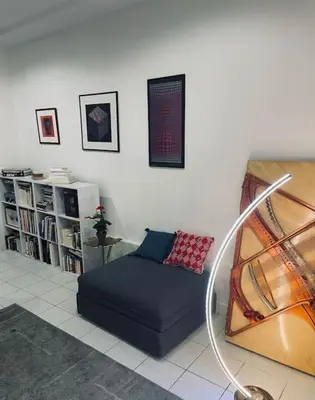 Coin salon dans l'établissement Large apartment in Paris center