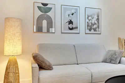 Coin salon dans l'établissement Apartment Arc de Triomphe by Studio prestige
