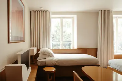 Un ou plusieurs lits dans un hébergement de l'établissement Edgar Suites - Bouchardon