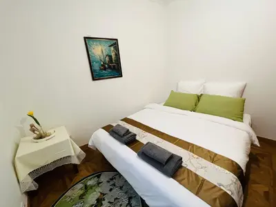 Un ou plusieurs lits dans un hébergement de l'établissement two-bedroom flat near Pompidou Centre