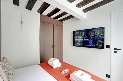 Un ou plusieurs lits dans un hébergement de l'établissement Amazing apartment 6P/2BR - Bastille
