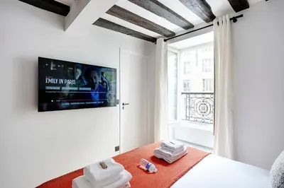 Télévision ou salle de divertissement dans l'établissement Amazing apartment 6P/2BR - Bastille