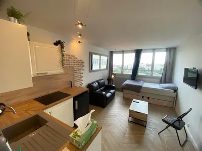 Télévision ou salle de divertissement dans l'établissement Full Loft in PARIS - 2 single beds for 2 - Chinatown
