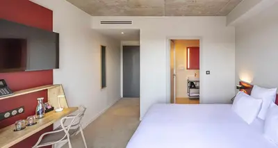 Un ou plusieurs lits dans un hébergement de l'établissement Best Western 11BAUER Paris Saint-Ouen