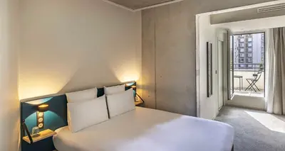 Un ou plusieurs lits dans un hébergement de l'établissement Best Western 11BAUER Paris Saint-Ouen