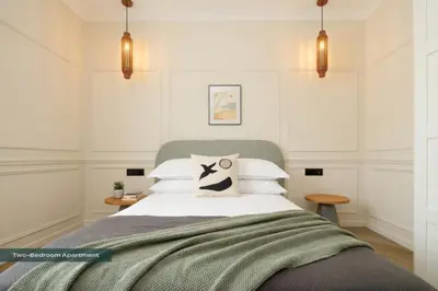 Un ou plusieurs lits dans un hébergement de l'établissement PoeticStay - Champs d'Elysée