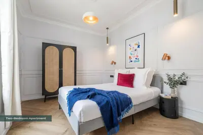 Un ou plusieurs lits dans un hébergement de l'établissement PoeticStay - Champs d'Elysée