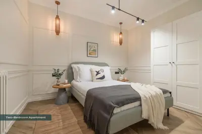 Un ou plusieurs lits dans un hébergement de l'établissement PoeticStay - Champs d'Elysée