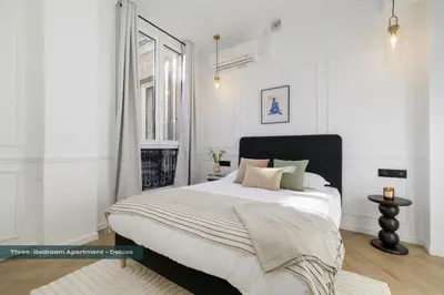 Un ou plusieurs lits dans un hébergement de l'établissement PoeticStay - Champs d'Elysée