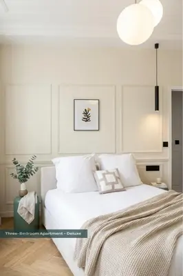 Un ou plusieurs lits dans un hébergement de l'établissement PoeticStay - Champs d'Elysée
