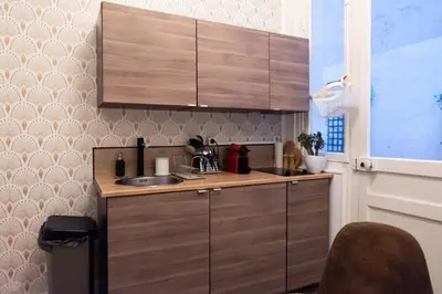 Cuisine ou kitchenette dans l'établissement Apartment Arc de Triomphe Champs Elysées