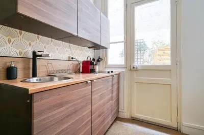 Cuisine ou kitchenette dans l'établissement Apartment Arc de Triomphe Champs Elysées