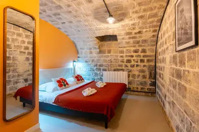 Un ou plusieurs lits dans un hébergement de l'établissement Nouveau - Industrial Appartement - 6p - Gym/Sauna