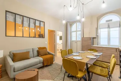 Coin salon dans l'établissement Nouveau - Designer Appartement - 6p
