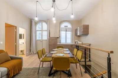 Coin salon dans l'établissement Nouveau - Designer Appartement - 6p