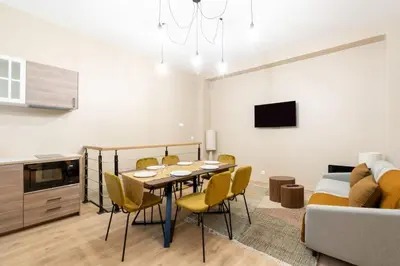 Coin salon dans l'établissement Nouveau - Designer Appartement - 6p