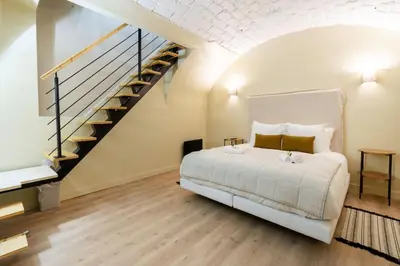 Un ou plusieurs lits dans un hébergement de l'établissement Nouveau - Designer Appartement - 6p