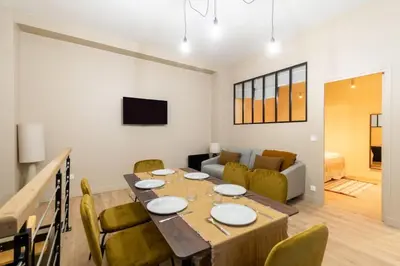 Coin salon dans l'établissement Nouveau - Designer Appartement - 6p