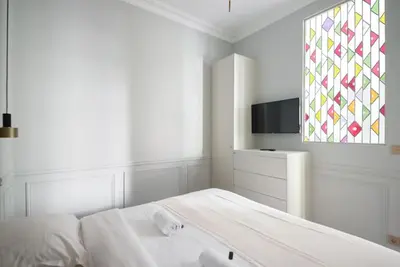 Un ou plusieurs lits dans un hébergement de l'établissement Bright and Gorgeous flat in the heart of Paris