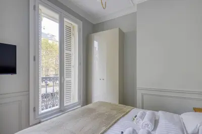 Un ou plusieurs lits dans un hébergement de l'établissement Bright and Gorgeous flat in the heart of Paris