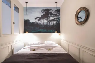 Un ou plusieurs lits dans un hébergement de l'établissement Modern and Cosy flat in the heart of Notre Dame