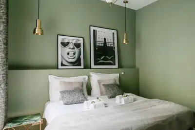 Un ou plusieurs lits dans un hébergement de l'établissement Stylish 2 bedrooms Palais Royal