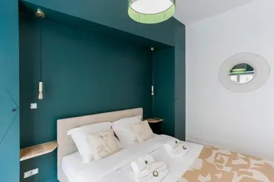 Un ou plusieurs lits dans un hébergement de l'établissement Modern 2 bedrooms near Louvre