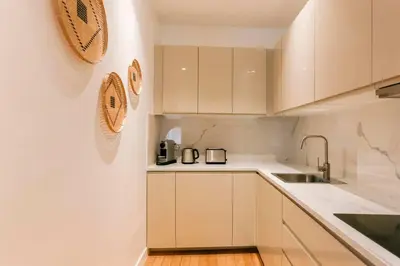 Cuisine ou kitchenette dans l'établissement Modern 2 bedrooms near Louvre