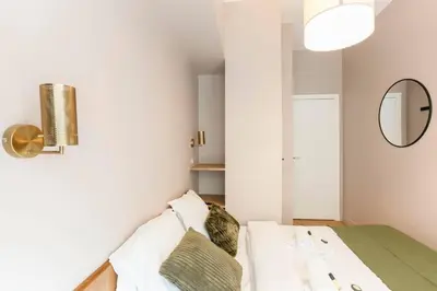Un ou plusieurs lits dans un hébergement de l'établissement Modern 2 bedrooms near Louvre