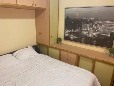 Un ou plusieurs lits dans un hébergement de l'établissement Entire cozy apartment near Eiffel tower in Paris